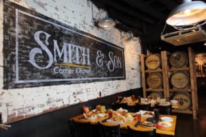 smith and son sign with food on a table